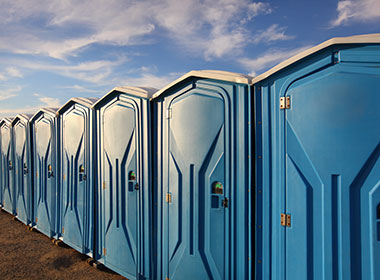 How often does a portable toilet need to be emptied